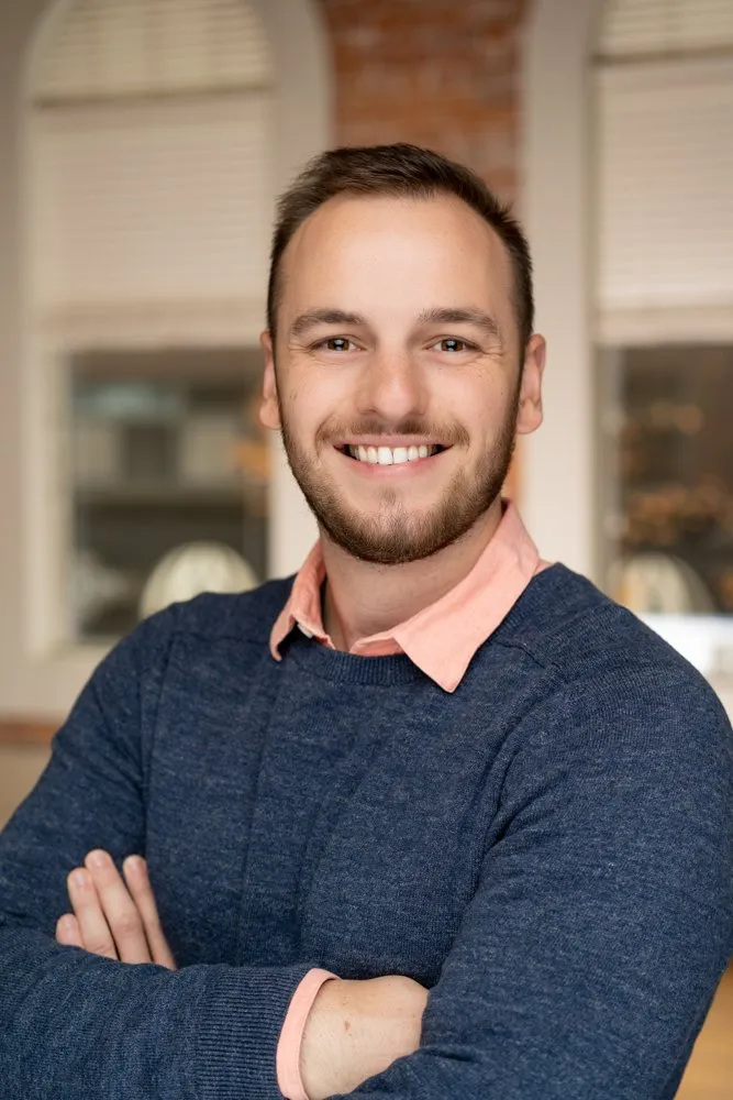 Professional headshot of Andrew Weber