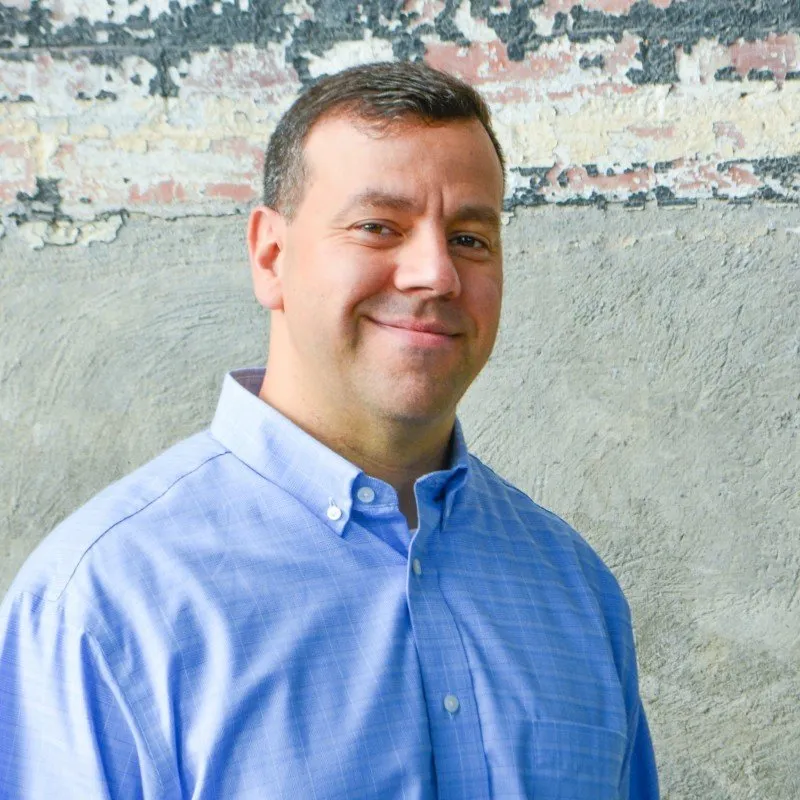 Professional headshot of David Dominguez, owner of Apregem