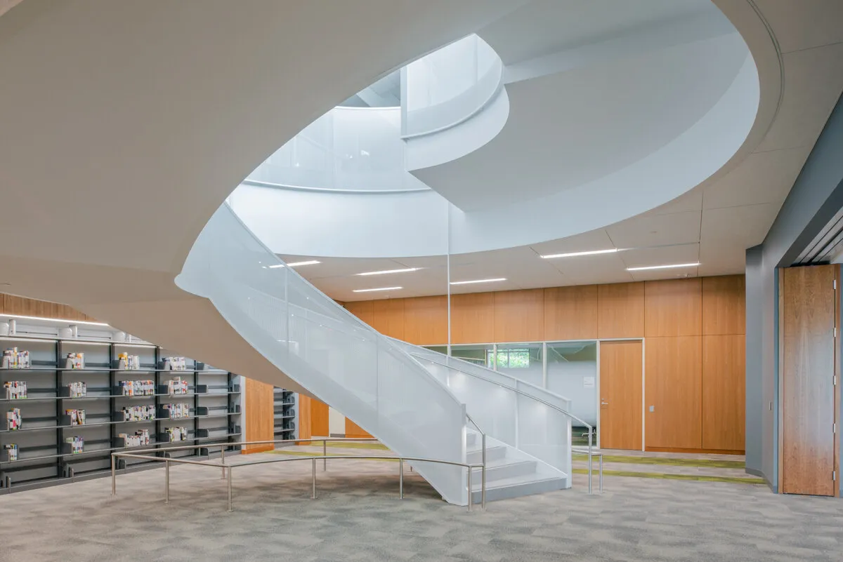 Fayetteville Public Library interior with a sculptural white staircase, Fayetteville, Arkansas