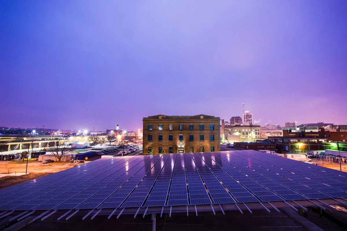 Market One rooftop solar array at twilight, Des Moines
