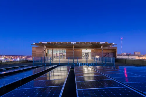 Market One rooftop patio at blue hour, Des Moines