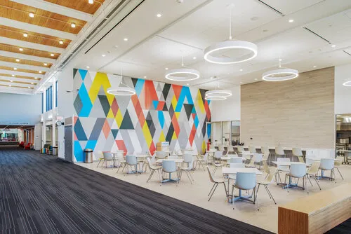 Waterloo Career Center dining area with colorful mural