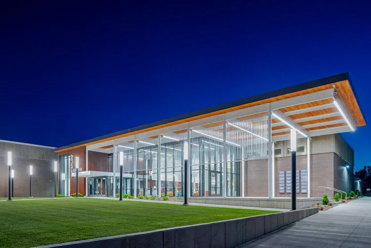 Waterloo Career Center northeast exterior lit at dusk